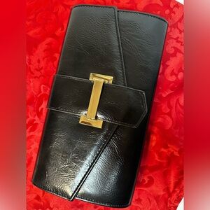 NWOT Black Clutch/Crossbody bag with Gold Accent